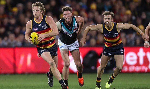 AFL 2018 Round 20 - Adelaide v Port Adelaide ADELAIDE, AUSTRALIA - AUGUST 04: Rory Sloane of the Crows breaks away during the 2018 AFL round 20 match between the Adelaide Crows and the Port Adelaide Power at the Adelaide Oval on August 04, 2018 in Adelaide, Australia. (Photo by AFL Media)